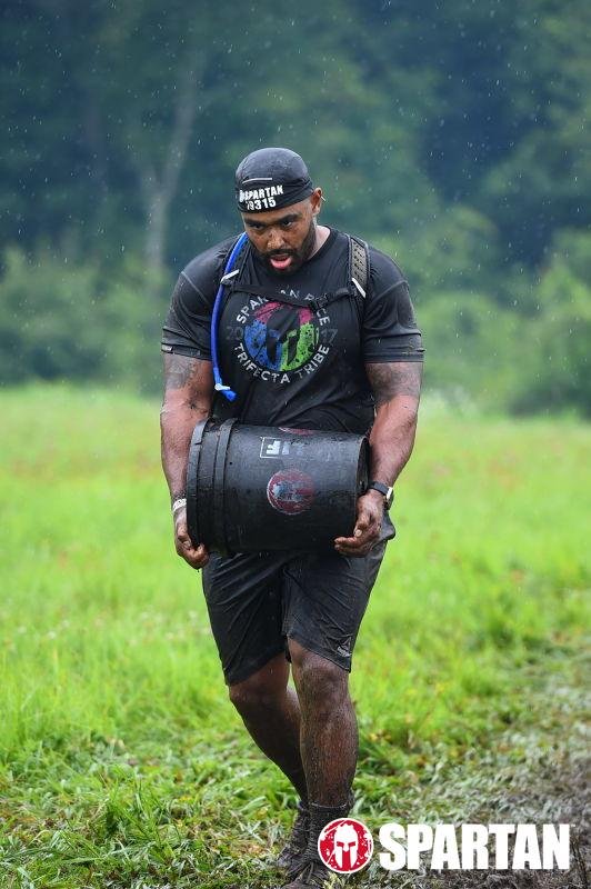 Frank Smith III Spartan Boston bucket carry