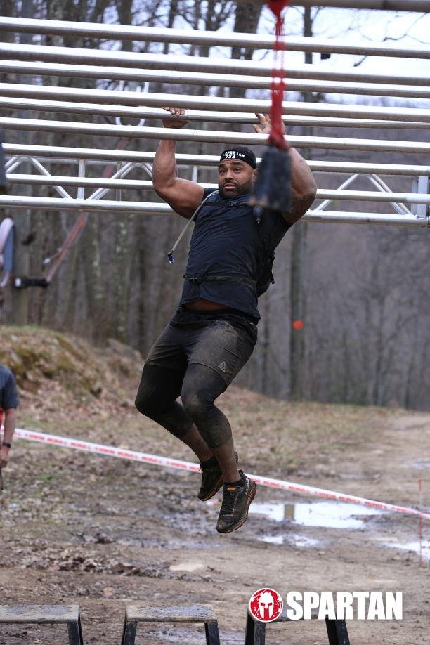 Frank Smith III on Spartan race monkey bars